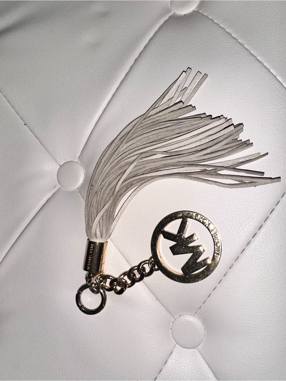 Michael Kors Light Gray Suede Tassel Keychain with Gold MK Logo